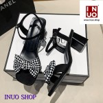 Zapatillas de tacon alto con nudo de moño